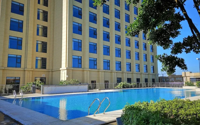 Ramada Plaza Dongxing City Center