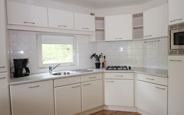 Nice chalet with dishwasher surrounded by greenery