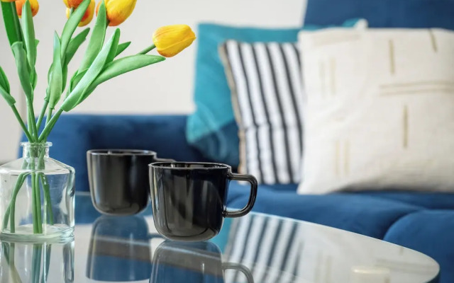 Wroclaw Dark Blue Apartment by Renters