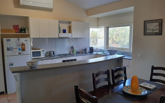 Elevated holiday house in bush setting overlooking wetlands