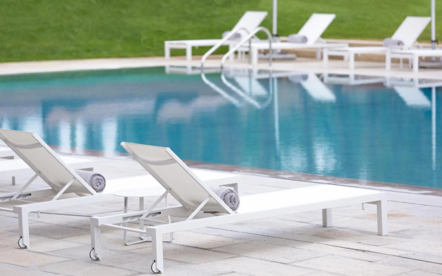 Ozadi Tavira Hotel