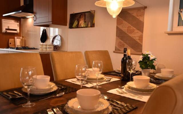 Exclusive Holiday Home Floating on a Lake in Friesland