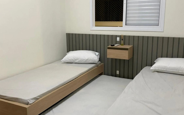 Apartamento em Bertioga com varanda gourmet