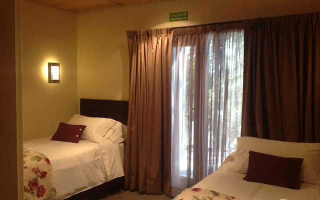 Maria del Bosque Apart Hotel / Cabañas