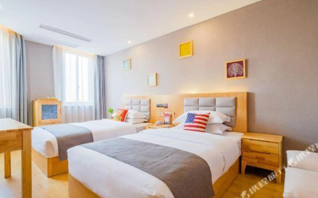 Home Inn Huaxuan Select Hotel (Jiaxing Bagua Band Store)