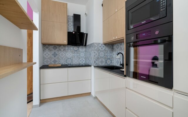 Dark Grey and Pink Apartment by Renters