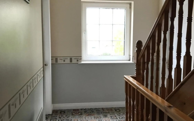 Derreen Tighue House