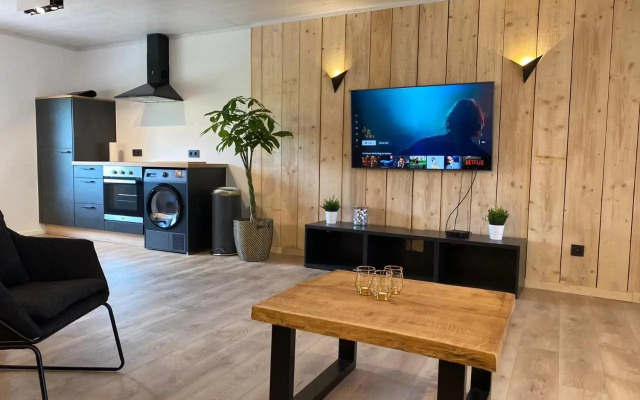 Wooden Soul : duplex 2 chambres avec jardin commun
