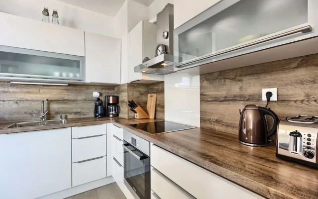 Seaside Apartment with Pool