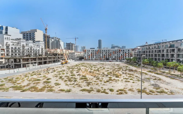 Waves - Stylish 1BR in JVC with Balcony & Pool