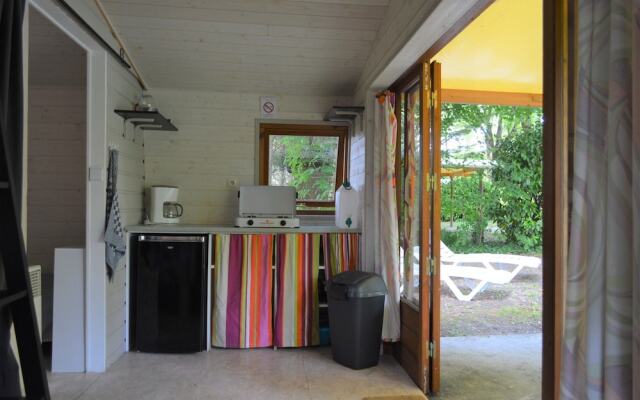 Camping Le Petit Lion - Lodges Bois