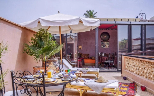 "room in Guest Room - Riad Lakouas Triple Room With Pool View"