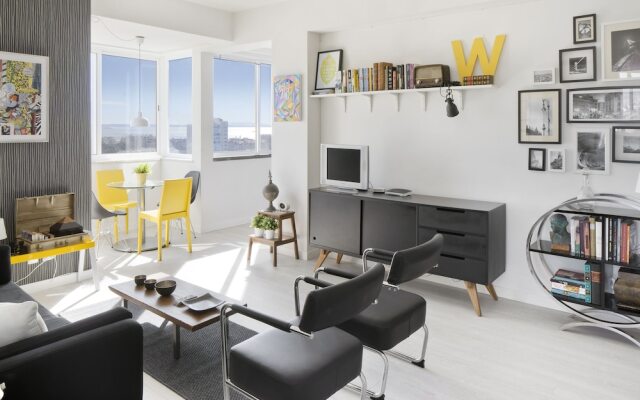 Prime Apartments White and Yellow