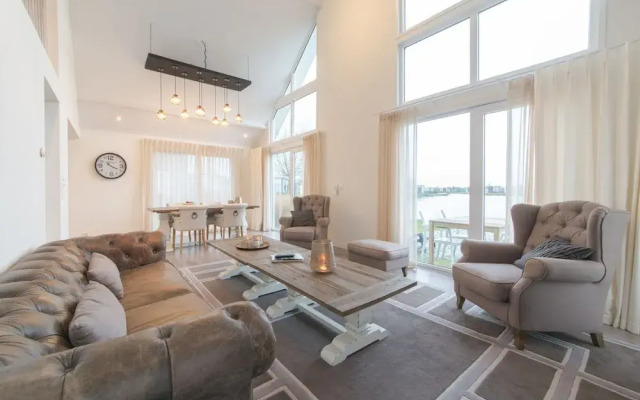 Stylish Holiday Home with Fireplace near Oosterschelde