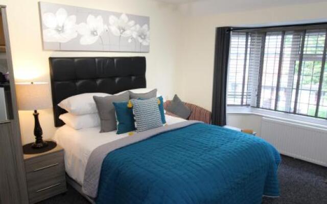 Holcombe House Aparthotel