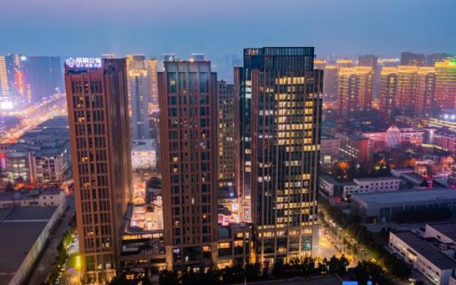 Wutong Apartments Hotel