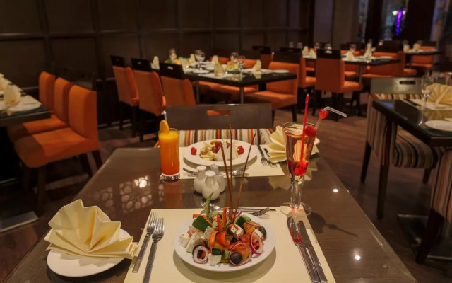 Golden Tulip Suites Breida Al Q