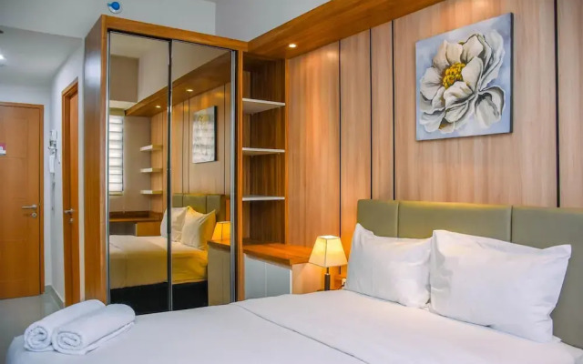 Nice And Cozy Studio At Evenciio Apartment