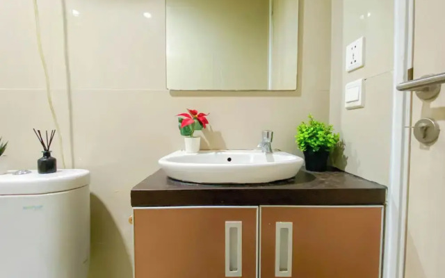 Simple 2Br At Azalea Suites Apartment