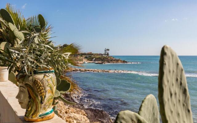 Blue house on the sea