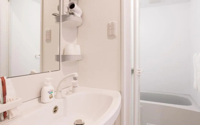 Condominium Resort Naha Living Inn Asahibashiekimae Premier and Annex