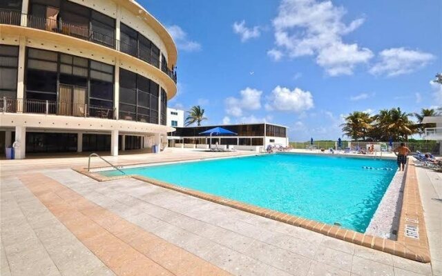 Castle Beach Club Condominiums by New Point Miami