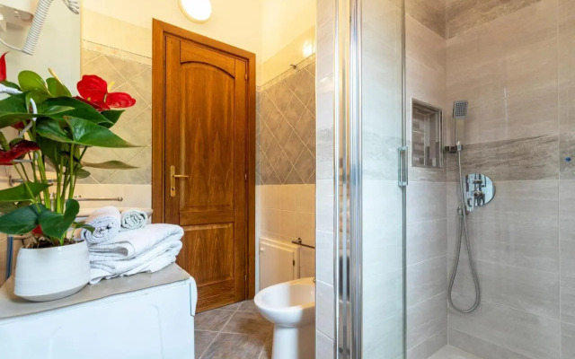 Appartamento con piscina 13