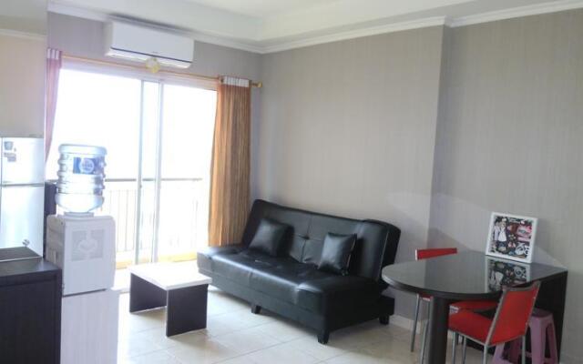 Dina Property at City Home MOI Apartment