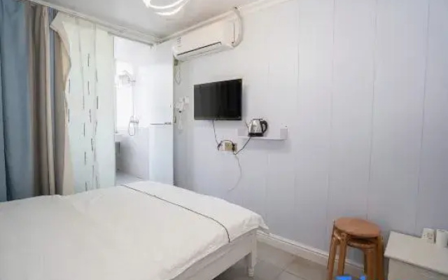 X9 E-sports Movie Homestay (Guanggu Plaza)
