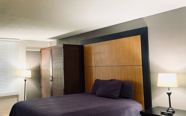 Apm Inn & Suites