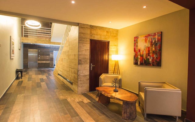 Earl Heights Suites Hotel