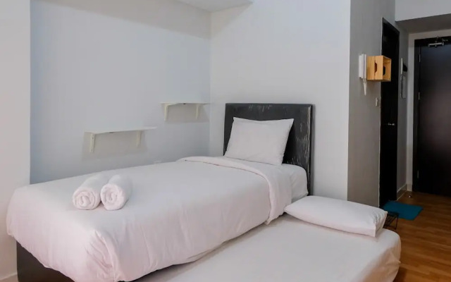 Homey Studio Room At Casa De Parco Apartment By Travelio