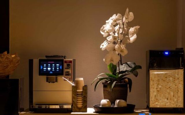 Xishuangbanna Jinghong Yakatu Theme Inn (Mengle Dafo Temple)