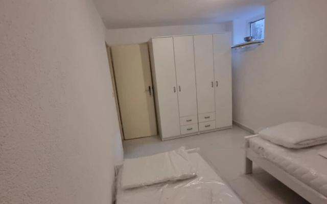 Four Bedroom apt w Patio Close to Beach and Center