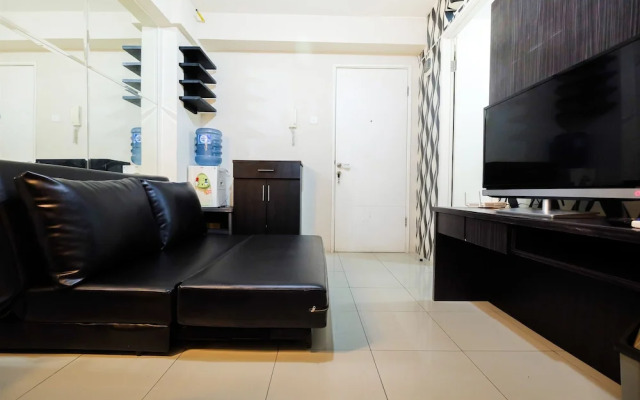 Monochrome Style 2 Bedrooms at Kalibata City Apartment By Travelio
