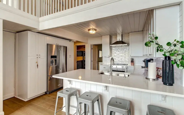 Roomy Chalet-Style Beachfront Condo with Private Beach Access by RedAwning
