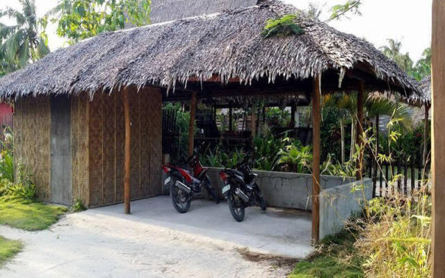 Tiki Bungalows and Bar