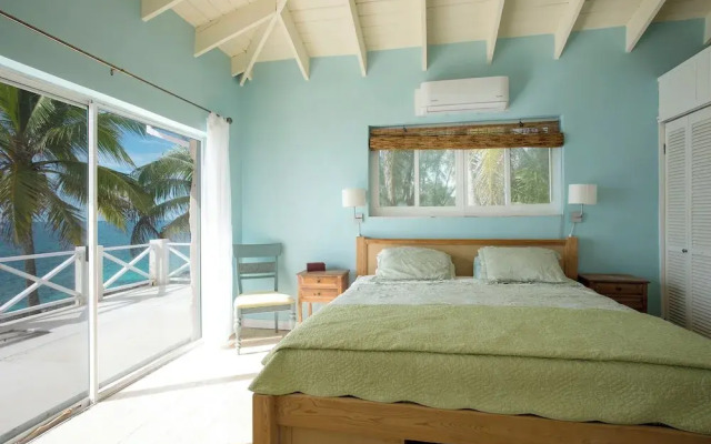 Island Paradise: Secluded Beachfront Retreat With Pool