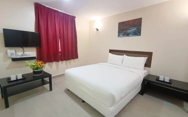 Capital O 90897 Island City Hotel