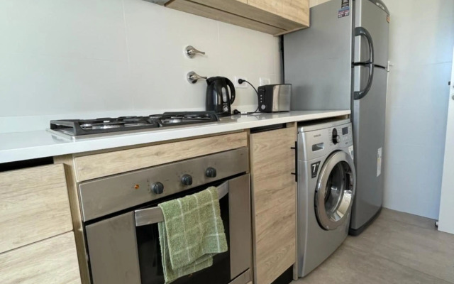 Departamento Moderno - Equipado y Con Cochera Privada