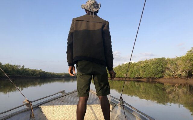 Saadani Safari Lodge - bush, river, beach