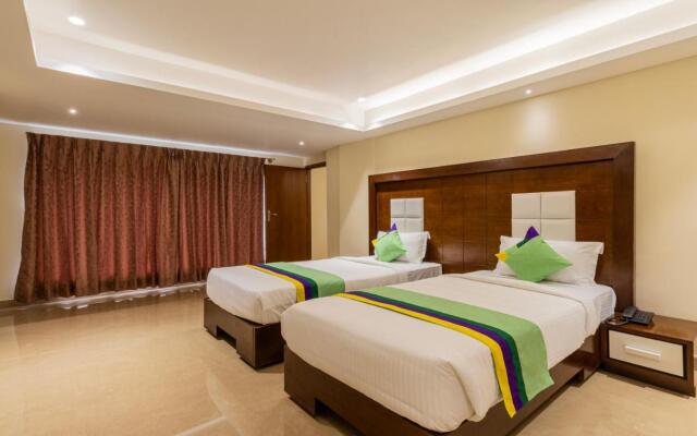 Treebo Suvarna Comforts