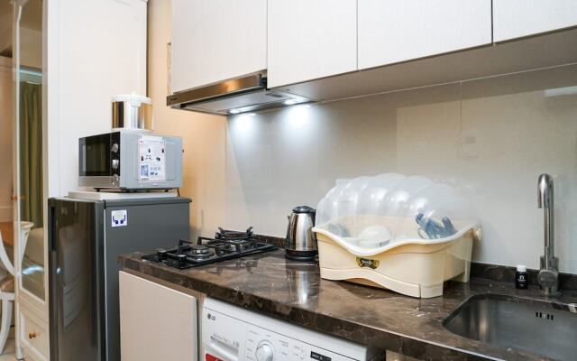 Comfy Studio at Puri Mansion Apartment by Travelio