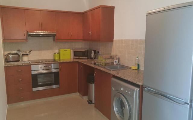 Stunning apartment C106 with balcony looking over pool