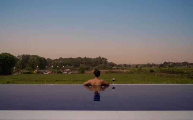 SaffronStays Onellaa, Nashik - infinity pool villa surrounded by a vineyard