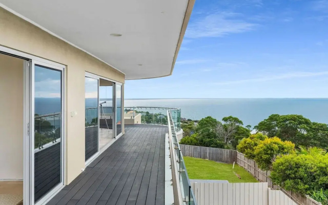 Cliffside Castle With Bay And City Views