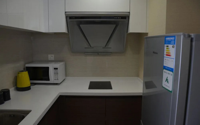 Dalian Sweetome Vacation Rental (Baiyue International)