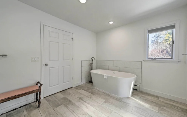 Tennis Court & 500' of Waterfront: Suttons Bay Gem