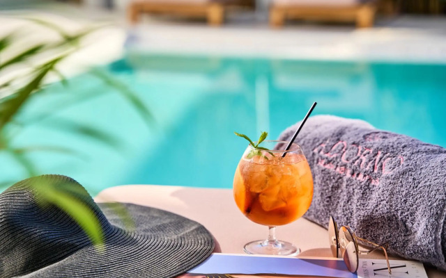 Adorno Beach Hotel & Suites