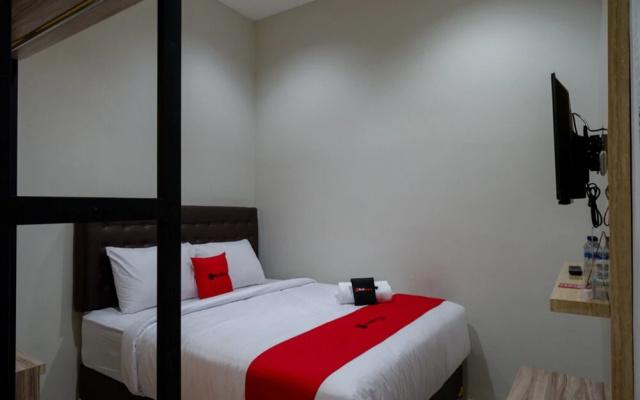 Gossip Guesthouse by Reddoorz